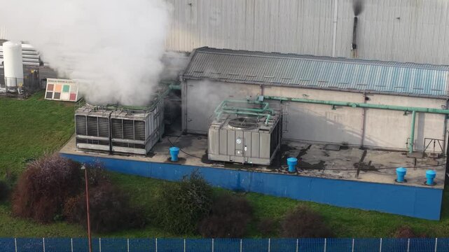 Drone Shot of Steam and Vapor From Cooling System of Metallurgic Factory