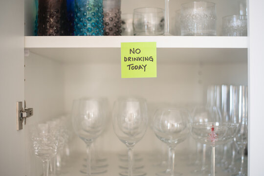 post-it note in cupboard to help quit drinking