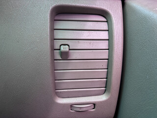 Close Up of Grey Plastic Car Air Conditioning Vent Texture