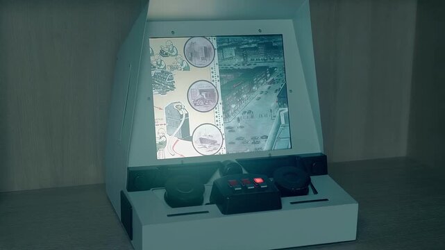 Display of a device that uses an old microfiche archiving technology. Shot in motion