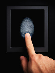 Secure touchscreen interface showing fingerprint scan on safe