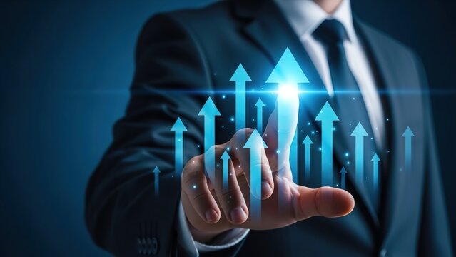 Businessman interacting with a futuristic holographic display showing glowing blue upward arrows, symbolizing business growth, success, and technological advancement. - Powered by Adobe