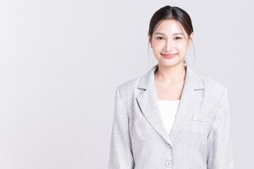 Portrait confident young asian businesswoman standing and smiling isolated on white background, or businesswoman startup concept.
