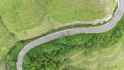 The beautiful and winding roads at the hilltops and across the savanna valleys when the grasses...