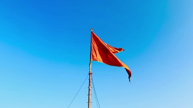 Saffron flag on blue sky