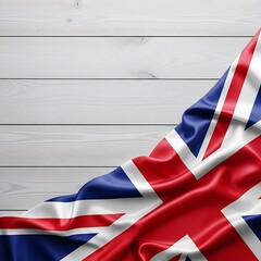 United Kingdom flag waving on white wood background