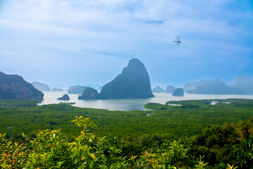 Obraz premium A view of Phang Nga Bay during the day. Samet Nangshe observation deck in Phang Nga Province, Thailand. A beautiful tropical landscape.