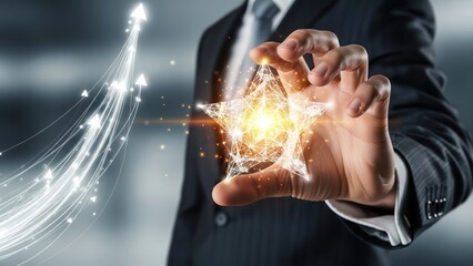 Closeup Businessman Hand holding virtual star, representing ambition, top performance, reaching goals, and shining business success