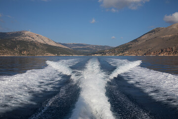 Traveling by sea on a yacht from the AGIA EFIMIA marina, KEFALONIA Island, Ionian Islands, Greece in the summer morning.