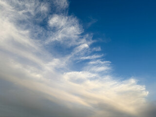 Big white clouds on blue sky view.