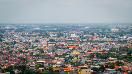 Fototapeta premium Urban lifestyle scene in Tangerang City, Banten, Indonesia featuring architecture and city surroundings