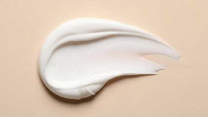 White cream smear on beige surface