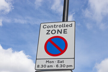 Controlled Parking Zone Road Sign on Urban Street