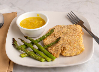  haddock with  roasted asparagus and cream corn