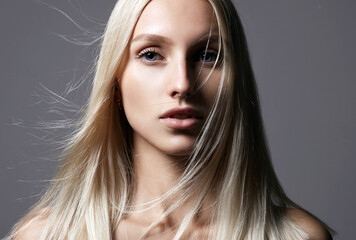 sensual beautiful young woman with blond hair