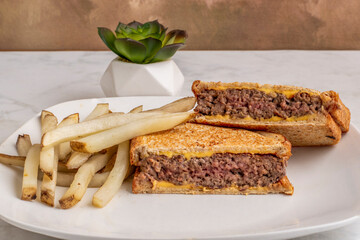 burger  melt sandwich with  french fries