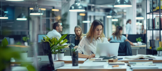 Focused Professional in a Modern Office: A focused individual engrossed in their work within a contemporary office setting, other professionals collaborate on projects.