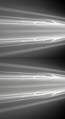 Abstract Light Trails on Dark Background Creating Smooth Motion Effect in Design