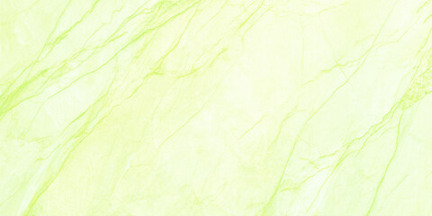 A close up view of pale green and yellow marble texture with delicate veining patterns creating an elegant backdrop