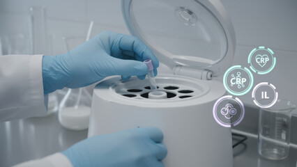 Laboratory centrifuge technology enhances longevity of sample analysis with precise scientific equipment and gloved hands handling test tubes
