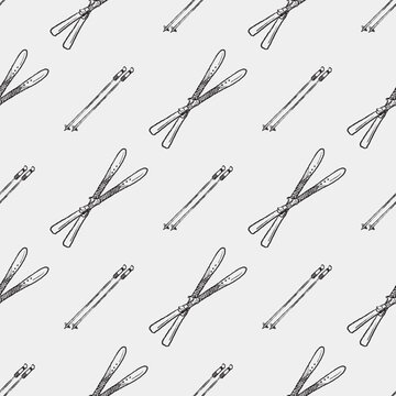 Hand drawn seamless pattern with skies and poles. Winter sports activity. Print template, packaging paper. Vector sketch illustration in vintage crayon charcoal style
