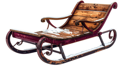 An antique, wooden sleigh with metal runners and a dusting of snow