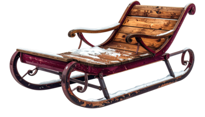 An antique, wooden sleigh with metal runners and a dusting of snow