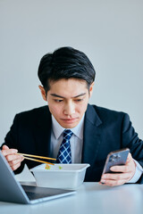 busy multitasking working lunch overworked