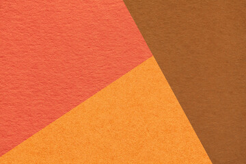 Fototapeta premium Geometric warm orange and brown texture paper background for presentation, banner or card design template