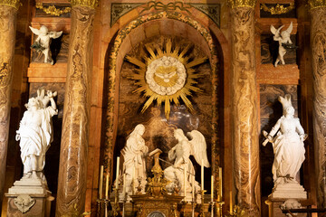 Fototapeta premium Intricate altar with statues and ornate decorations.. Cathedral of Malaga, Spain