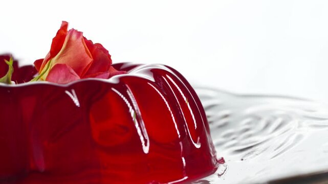 Spoon Touching Red Jelly Dessert, Macro Close-Up