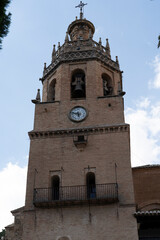 Obraz premium Historic clock tower with intricate architectural details.. Ronda, Málaga, Spain