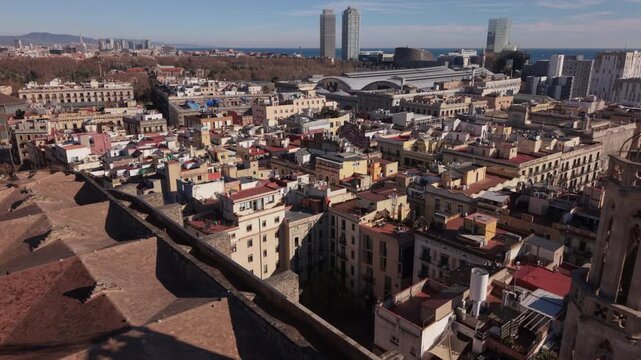 flying backwards revealing Santa Maria del Pi church in Barcelona