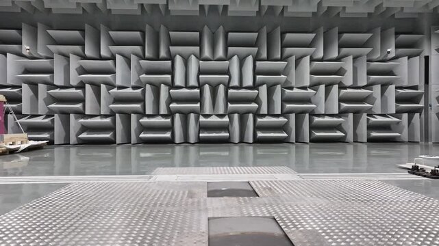 Close-up of gray three-dimensional acoustic sound-absorbing wall structure with geometric modular design