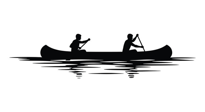 Two people paddling a canoe on water a striking black silhouette