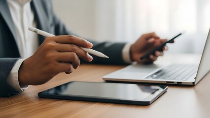 Professional working with digital devices and stylus