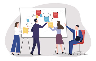 A group of professionals collaborate around a whiteboard, organizing documents to map out tasks or a project. Project planning, and collaborative problem solving.