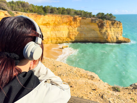 Corredoura Beach, sighted viewpoint on the trail of the Seven Suspended Valleys (Sete Vales Suspensos). Praia da Corredoura with flying seagulls near Benagil village, Algarve, Portugal. - Powered by Adobe