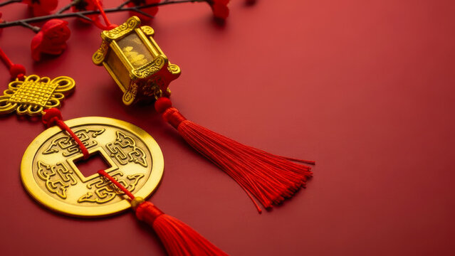 Chinese new year decoration with gold coin and red tassel