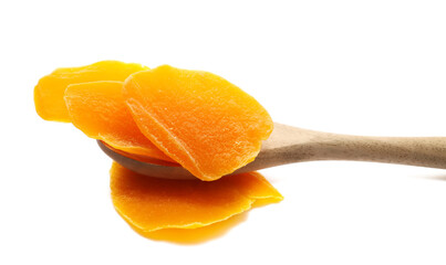 Candied mango slices in wooden spoon isolated on white background, side view
