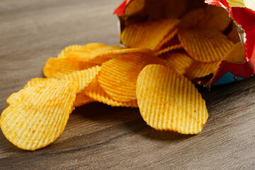 Potato chips , delicious BBQ seasoning spicy for crips, thin slice deep fried snack fast food.