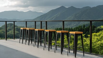 Naklejka premium Outdoor Bar Seating Overlooking a Mountainous Landscape, Perfect for Relaxing, Socializing, and Enjoying the View
