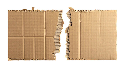 Close-up of ripped brown corrugated cardboard on a black background