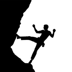 Silhouette of a Climber Ascending a Cliff Face with Determination.