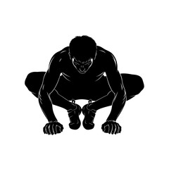 Silhouette of a muscular man in a crouching position.