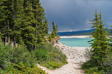 The turquoise water of Abraham Lake, Alberta, Canada.