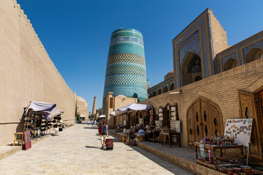 Khiva, Uzbekistan - 11 August 2025:  a street in the center, Kalta Minor minaret