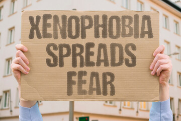 "Xenophobia Spreads Fear" Outsider hatred damages social fabric. OUTSIDER. HATRED. DAMAGES. SOCIAL. FABRIC.