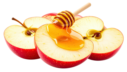 Close-up of sliced red apples with honey drizzling from a wooden dipper