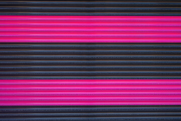 Closed Shop Shutter With Pink Stripes.